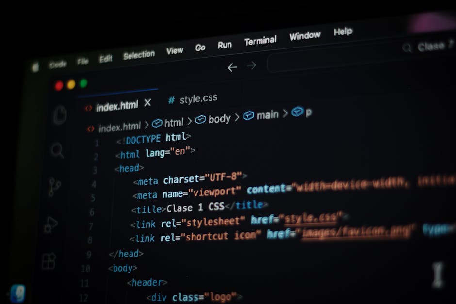 A computer screen displaying a code editor with HTML and CSS code focused on webpage structure and styling. The code includes tags such as <html>, <head>, <title>, and stylesheet links, with syntax hi